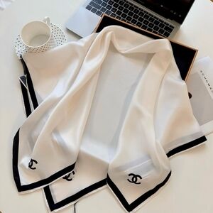 CHANEL White Silk Scarf with Black Trim and CC Logos